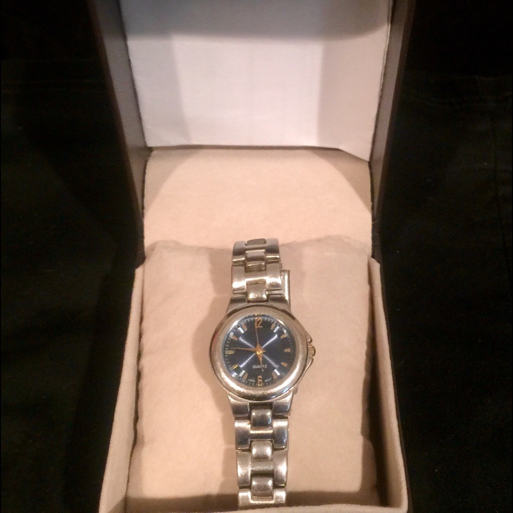 Silver watch with a Dark blue face